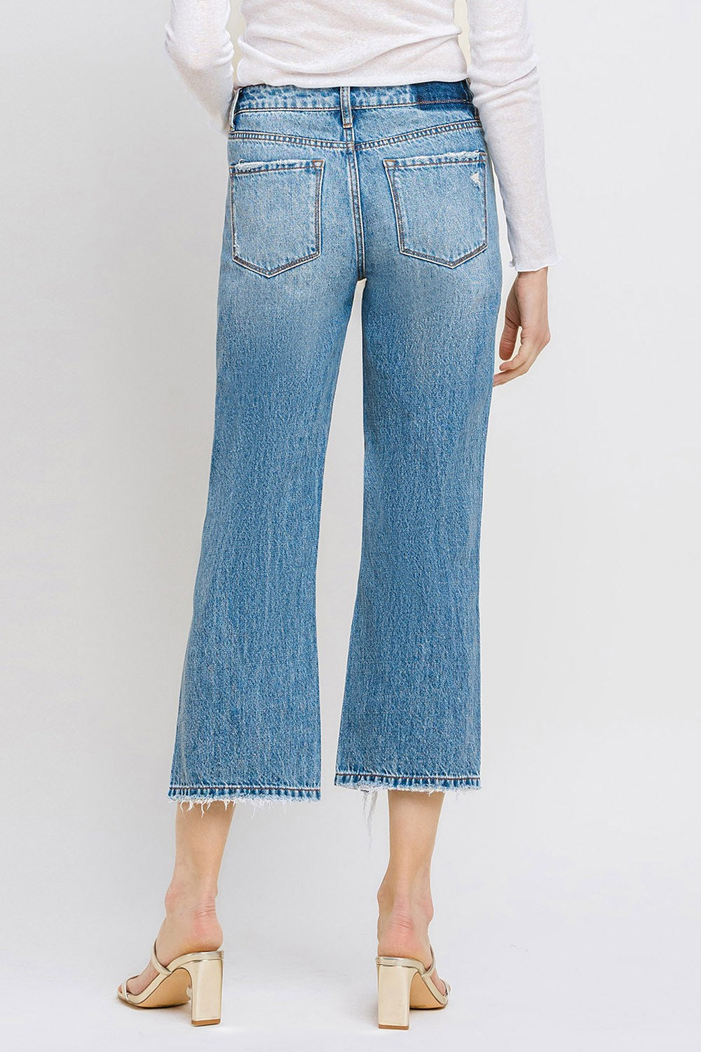 Vervet High Rise Uneven Raw Hem Kick Flare Jeans