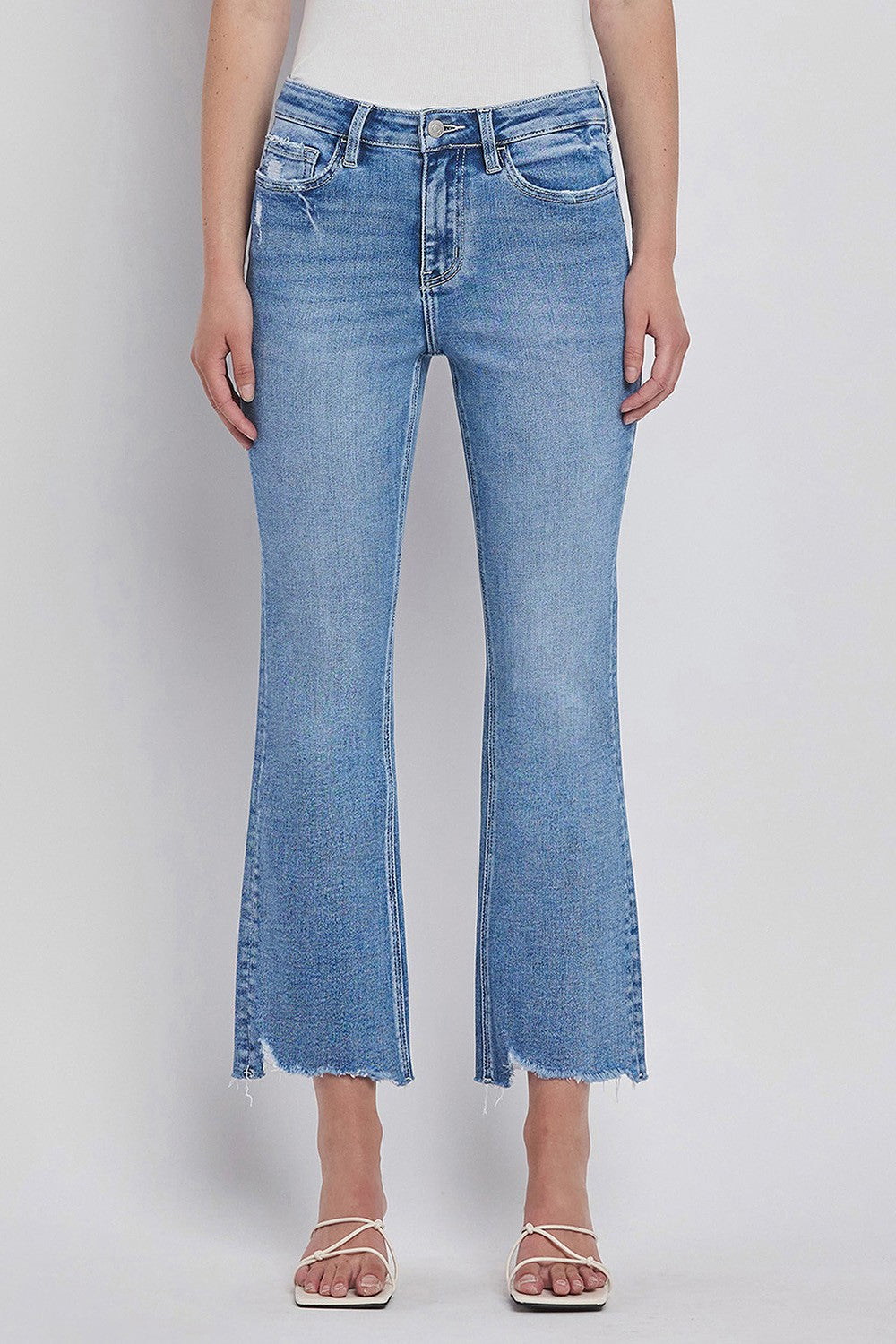 Vervet High Rise Uneven Raw Hem Kick Flare Jeans