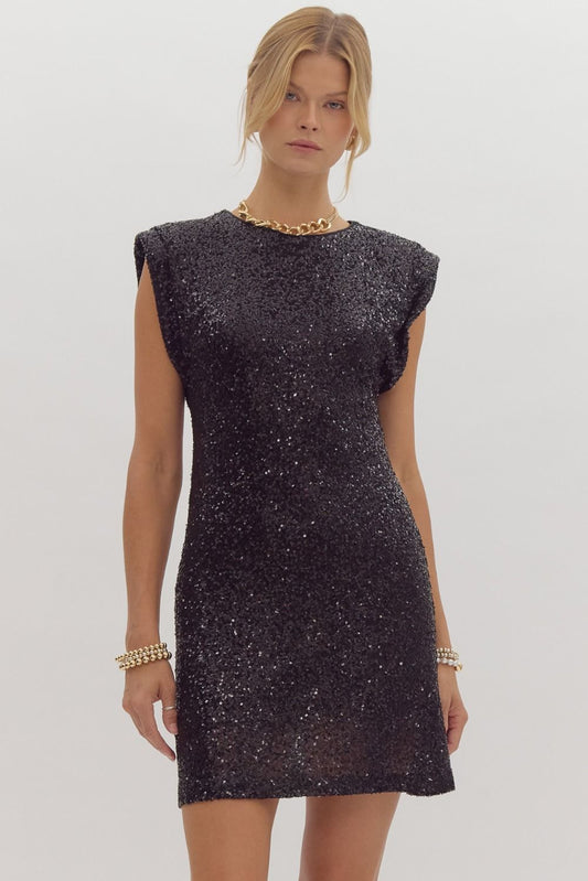 "Natalie" Sequin embellish sleeveless mini dress featuring structured padded shoulder with pleated detail.