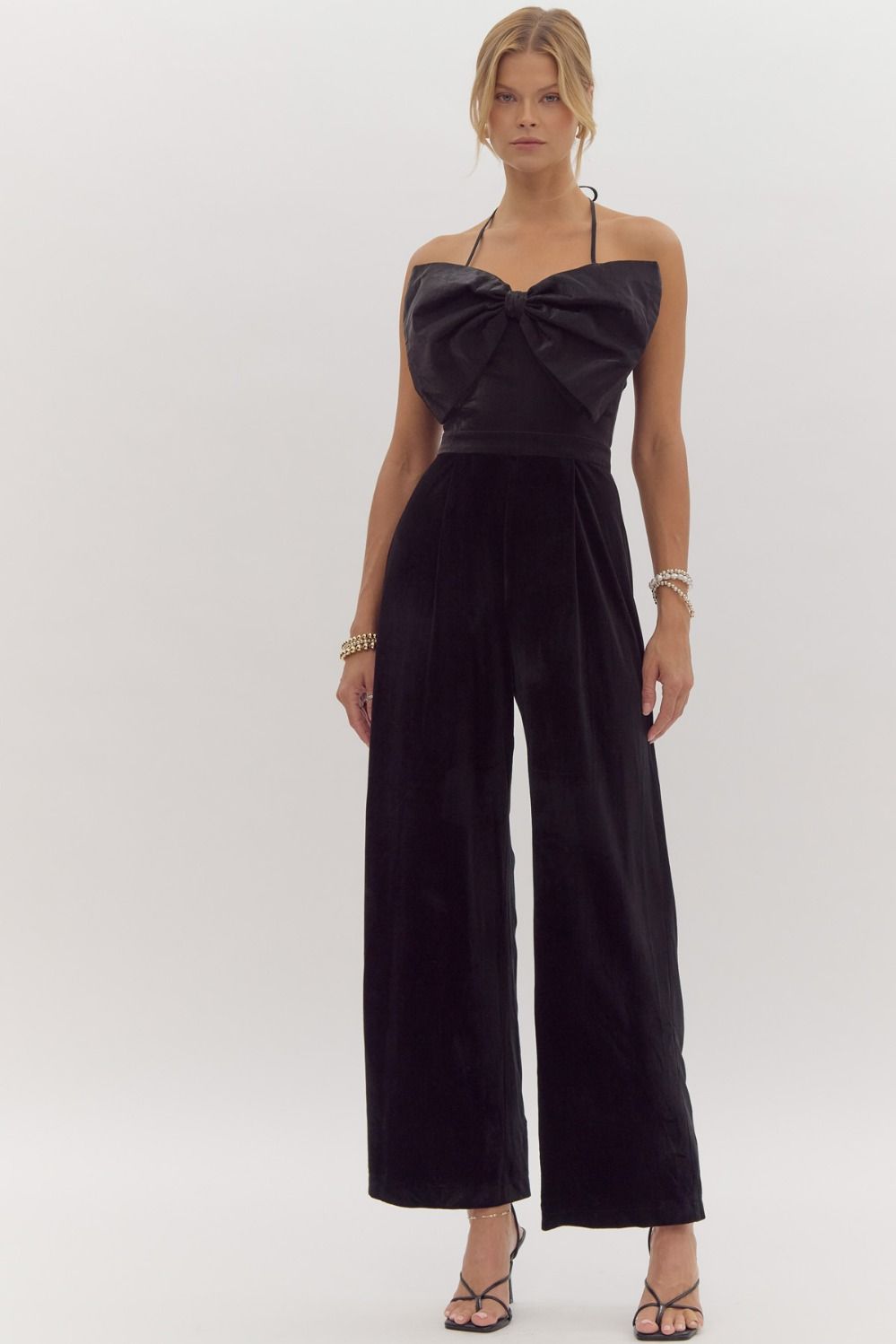 "BOW" Solid pleated velvet jumpsuit featuring oversized bow. Back zipper closure and multiway straps.