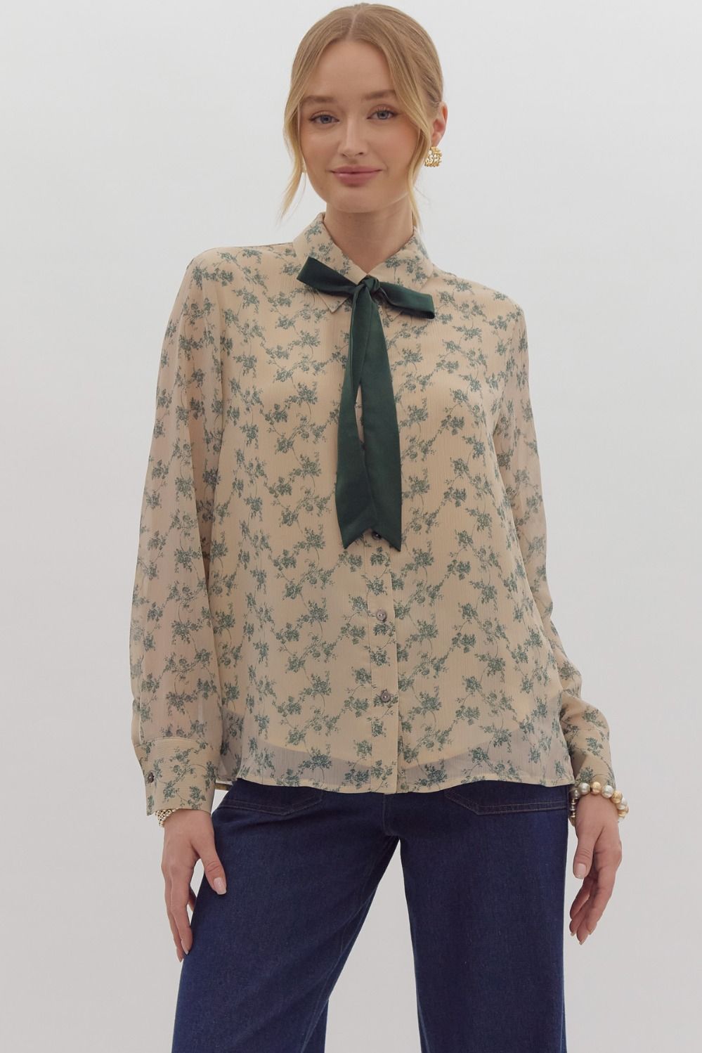 " ANGIE " Floral print long sleeve collared button up top featuring contrasting solid self-tie detail at neckline.